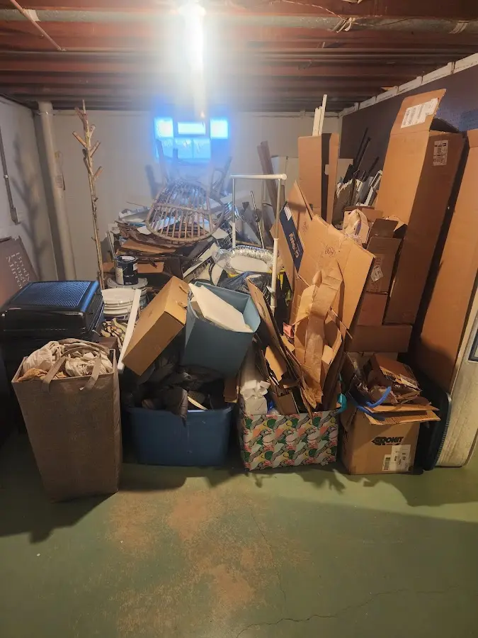 Roll-off dumpster container at job site for 15 Yard Dumpster Rental in Bryan